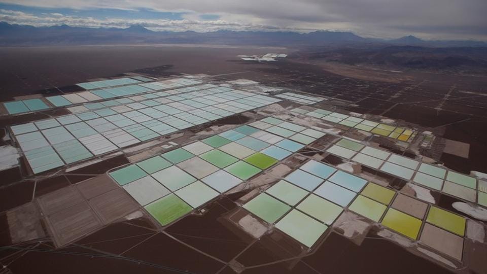 FILE PHOTO: An aerial view shows the brine pools of SQM lithium mine on the Atacama salt flat in the Atacama desert of northern Chile.