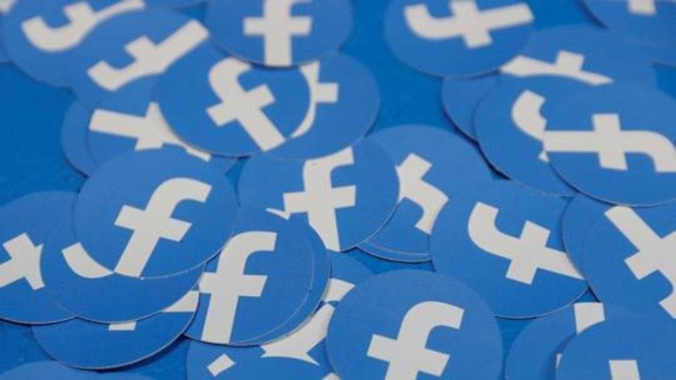 FILE PHOTO: Stickers bearing the Facebook logo are pictured at Facebook Inc's F8 developers conference in San Jose, California, U.S., April 30, 2019. REUTERS/Stephen Lam/File Photo