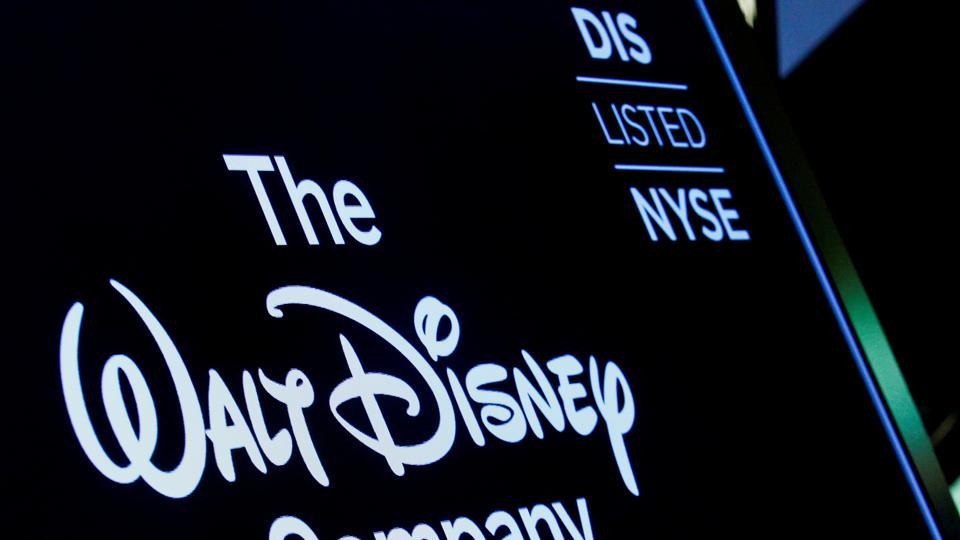 FILE PHOTO: A screen shows the logo and a ticker symbol for the Walt Disney Company on the floor of the New York Stock Exchange (NYSE) in New York, U.S., December 14, 2017. REUTERS/Brendan McDermid/File Photo