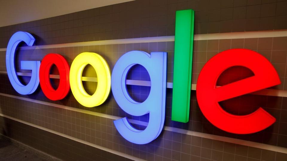 FILE PHOTO: An illuminated Google logo is seen inside an office building in Zurich, Switzerland December 5, 2018. REUTERS/Arnd Wiegmann