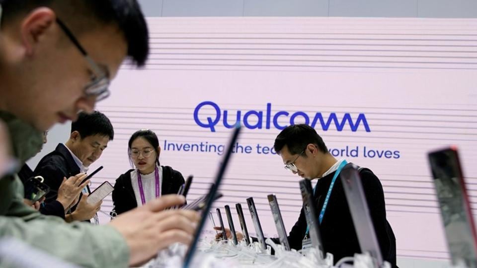 A Qualcomm sign is seen at the second China International Import Expo (CIIE) in Shanghai, China November 6, 2019. REUTERS/Aly Song/Files