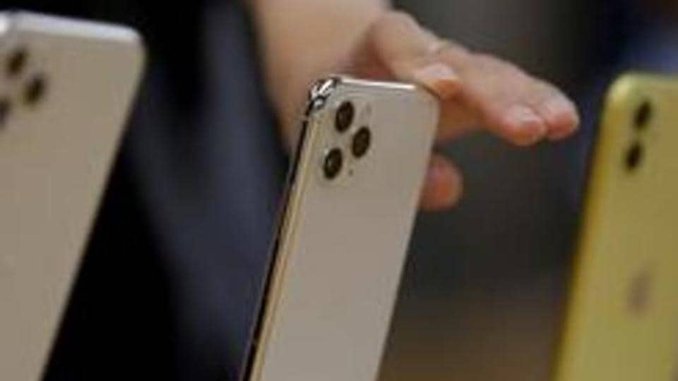 FILE PHOTO: Apple's new (L-R) iPhone 11 Pro Max, 11 Pro and 11 are displayed after they went on sale at the Apple Store in Beijing, China , September 20, 2019. REUTERS/Jason Lee