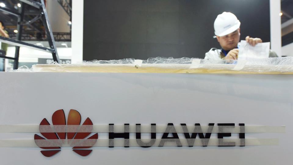 A Huawei sign is seen on its booth under construction ahead of an intelligent transportation expo in Hangzhou, Zhejiang province, China December 5, 2019.