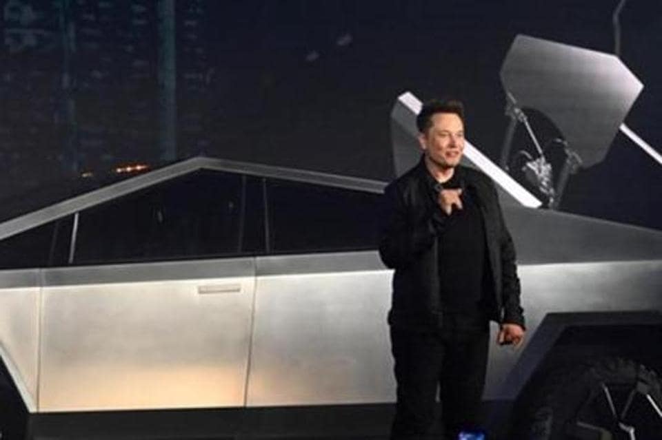 Tesla CEO Elon Musk unveils the Cybertruck at the TeslaDesign Studio in Hawthorne, Calif. Mandatory Credit: Robert Hanashiro-USA TODAY