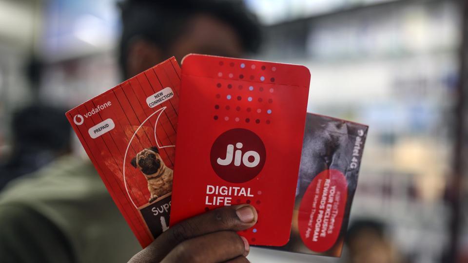 Sim card packets for Reliance Jio, the mobile network of Reliance Industries Ltd., are displayed for a photograph at a store in Mumbai, India, on Sunday, Jan. 19, 2020.