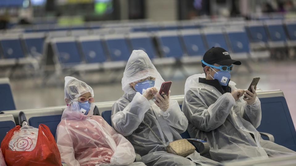 A family wearing masks and make-shift protection gear wait for their train at the Hongqiao High-speed Railway Station in Shanghai, China, on Tuesday, Feb. 11, 2020. The death toll from the coronavirus climbed above 1,000, as the Chinese province at the epicenter of the outbreak reported its highest number of fatalities yet. A family wearing masks and make-shift protection gear wait for their train at the Hongqiao High-speed Railway Station in Shanghai, China, on Tuesday, Feb. 11, 2020. The death toll from the coronavirus climbed above 1,000, as the Chinese province at the epicenter of the outbreak reported its highest number of fatalities yet.