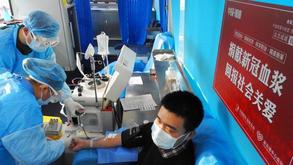 A man who has recovered from the novel coronavirus donates his blood in Lianyungang, Jiangsu province, China February 16, 2020. Picture taken February 16, 2020. China Daily via REUTERS
