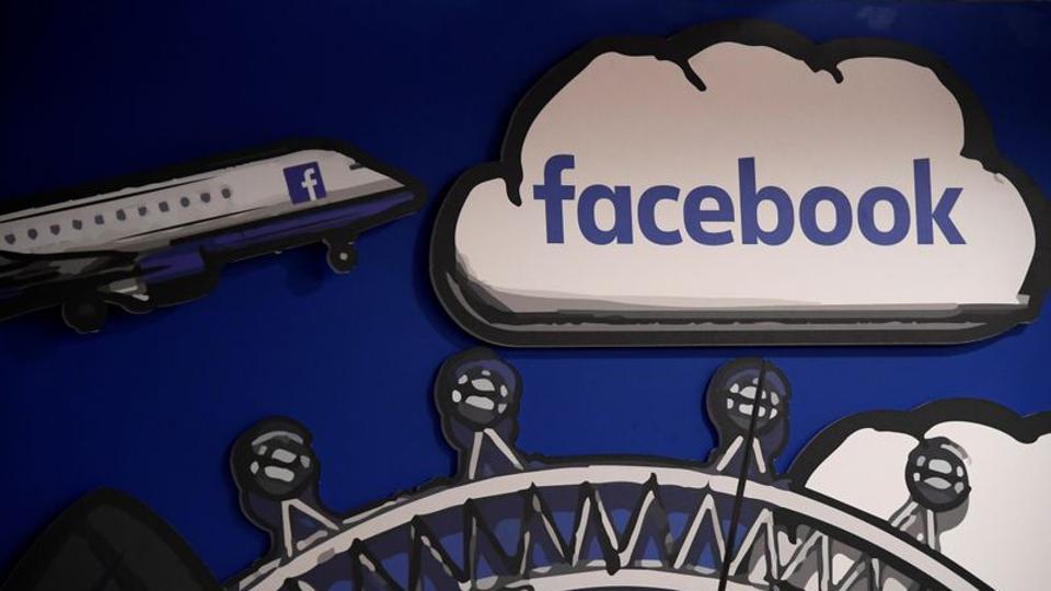 Facebook branding is seen in a workspace at the company's offices in London, Britain, January 20, 2020. REUTERS/Toby Melville/Files