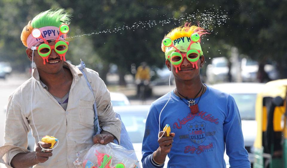Vendors selling water gun during upcoming Holi festival.
