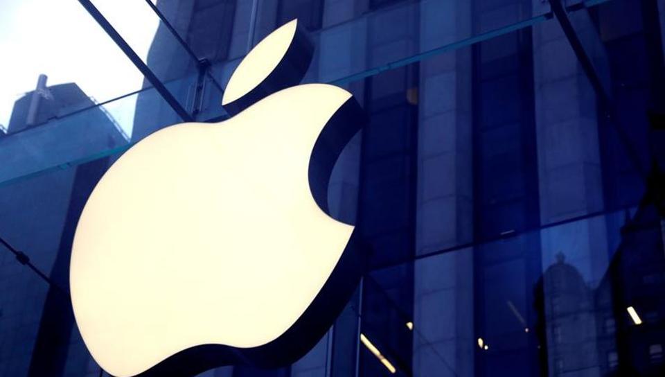 The Apple Inc. logo is seen hanging at the entrance to the Apple store on 5th Avenue in Manhattan, New York, US. Apple stores in the US closed till May due to the Covid-19 pandemic.