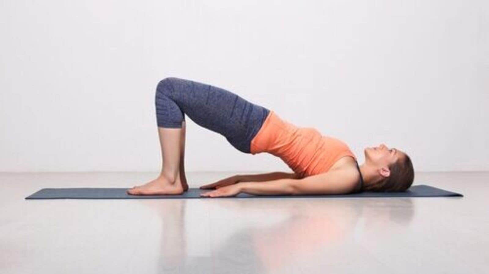 Yoga Pose Primer: Jathara Parivartanasana (Revolved Belly Pose) -  YogaUOnline