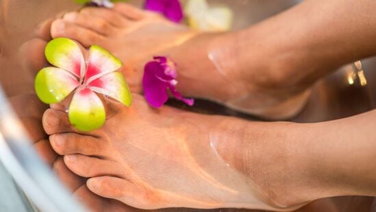 Soak your feet: Soaking your feet in warm water can help soften the skin and make it easier to remove dead skin cells. You can add Epsom salt or essential oils to the water to make it more soothing.&nbsp;