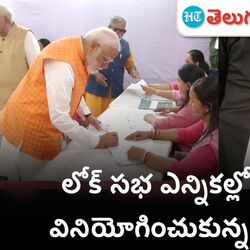 narendra modi casts his vote in vadodara