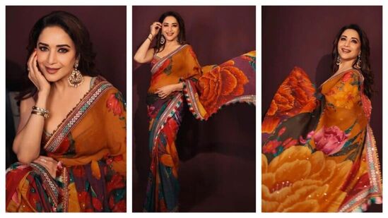 Celebrities Fashion: 50 ఏళ్ల వయసు దాటినా చెరగని అందంతో మతిపోగొట్టే మాధురి దీక్షిత్ ఫ్లోరల్ శారీ లుక్ ఇది. ఆ నవ్వు అందాన్ని రెట్టింపు చేసింది.