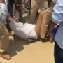 ఈడ్చుకెళ్తున్న పోలీసులు