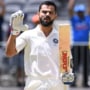 Virat Kohli's iconic celebration after reaching his century in Perth in 2018.