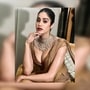 Janhvi Kapoor dazzled with smokey eyes, bold lips and statement jewellery. 